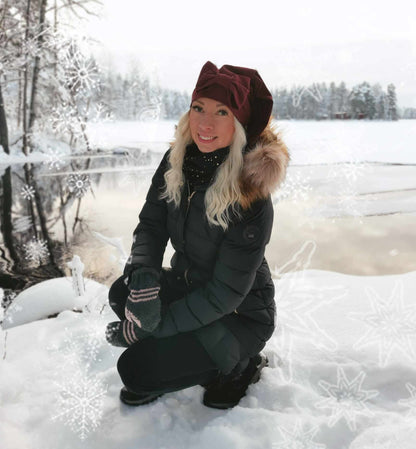 Viininpunainen tonttulakki rusetilla